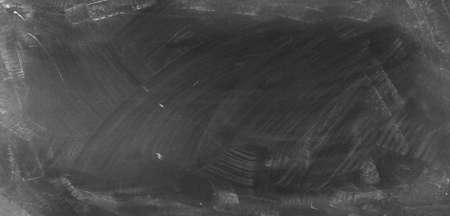 Chalk rubbed out on blackboard backgroundの写真素材