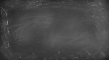 Chalk rubbed out on blackboard backgroundの写真素材