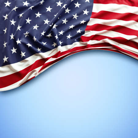 American flag on blue backgroundの写真素材