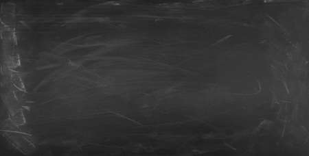 Chalk rubbed out on blackboard backgroundの写真素材
