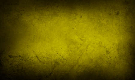 Yellow textured concrete wall background. Dark edgesの写真素材