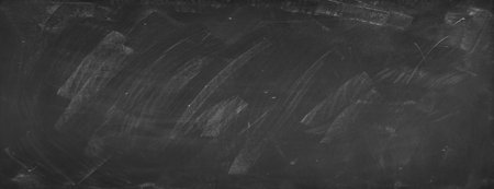 Chalk rubbed out on blackboard backgroundの写真素材