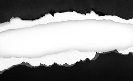 Ripped black paper on plain background, space for copyの写真素材