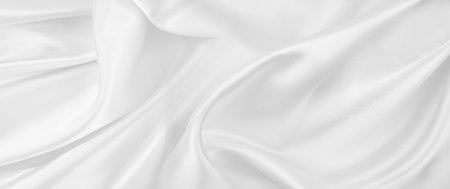 Rippled white silk fabric texture backgroundの写真素材