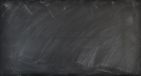 Chalk rubbed out on blackboard backgroundの写真素材