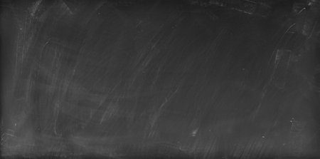 Chalk rubbed out on blackboard backgroundの写真素材