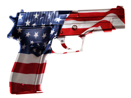 Handgun and American flag compositeの写真素材