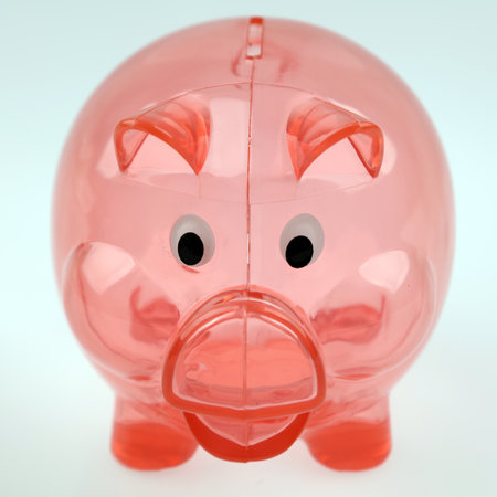 Empty pink plastic piggy bankの写真素材