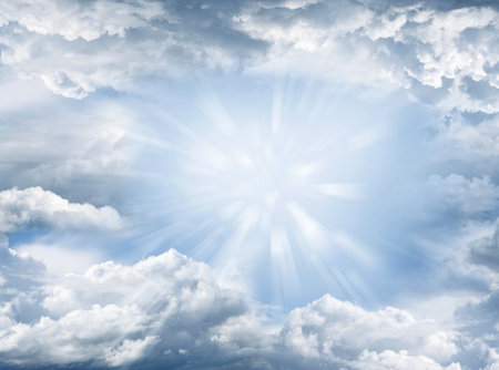 Bright rays shining in cloudsの写真素材