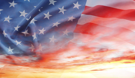 American flag in sunny skyの写真素材