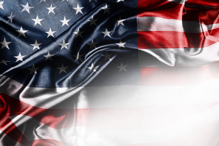 Closeup of American flag on white backgroundの写真素材
