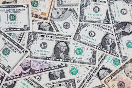 Close-up of assorted American banknotesの写真素材