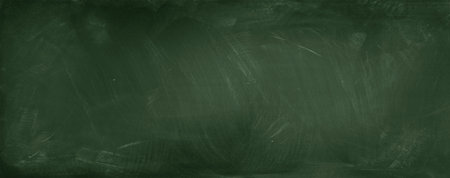 Chalk rubbed out on green chalkboard backgroundの写真素材