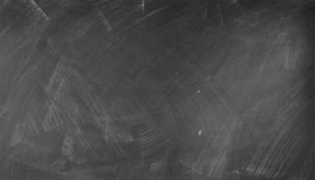 Chalk rubbed out on blackboard backgroundの写真素材