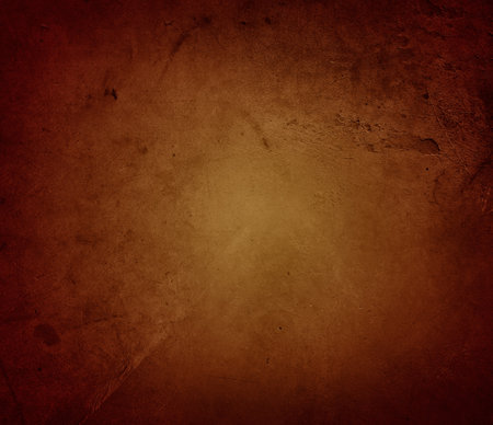 Orange textured concrete wall backgroundの写真素材