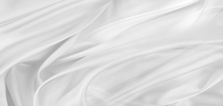 Rippled white silk fabric texture backgroundの写真素材