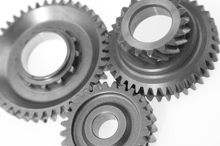 Metal cog gears joining togetherの写真素材