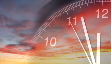 Clock face in bright sky. Time passing