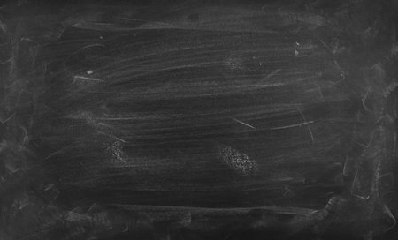 Chalk rubbed out on blackboard backgroundの写真素材