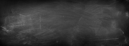 Chalk rubbed out on blackboard backgroundの写真素材