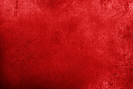 Red textured concrete wall backgroundの写真素材