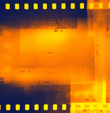 Film negative frames orange backgroundの写真素材