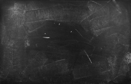 Chalk rubbed out on blackboard backgroundの写真素材