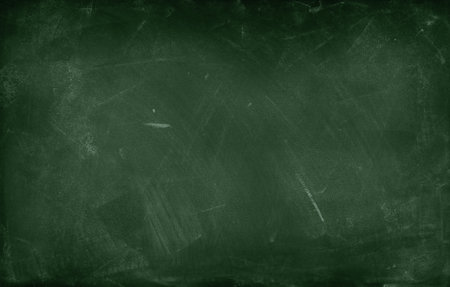 Chalk rubbed out on green chalkboard backgroundの写真素材