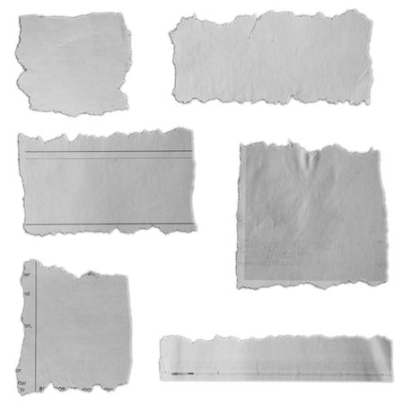 Six pieces of torn paper on plain backgroundの写真素材