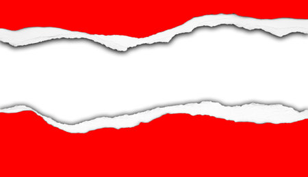 Hole ripped in red paper on white backgroundの写真素材