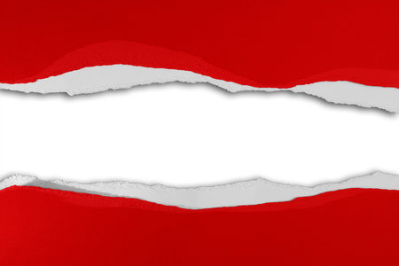 Hole ripped in red paper on white backgroundの写真素材
