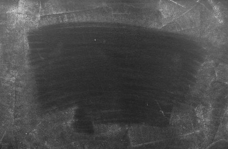Chalk rubbed out on blackboard backgroundの写真素材