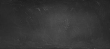 Chalk rubbed out on blackboard backgroundの写真素材