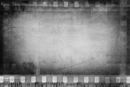 Film negative frames grey background. Copy spaceの写真素材
