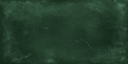 Chalk rubbed out on green chalkboard backgroundの写真素材
