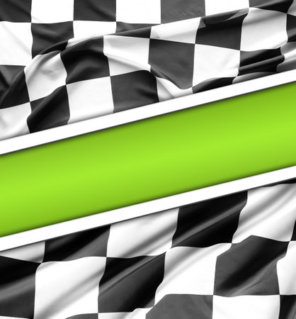 Checkered black and white flag on green backgroundの写真素材