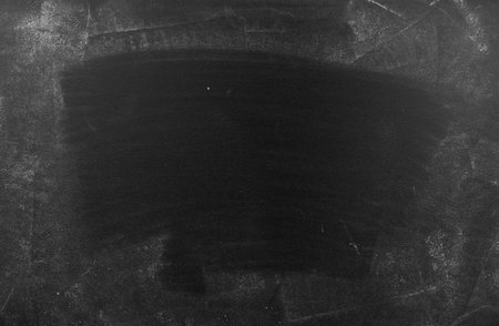 Chalk rubbed out on blackboard backgroundの写真素材