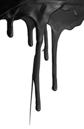 Black paint drips on white backgroundの写真素材