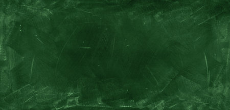Chalk rubbed out on green chalkboard backgroundの写真素材
