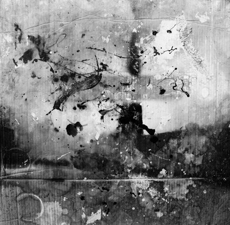 Splattered black and white paint abstract grunge backgroundの写真素材