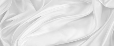 Rippled white silk fabric texture backgroundの写真素材