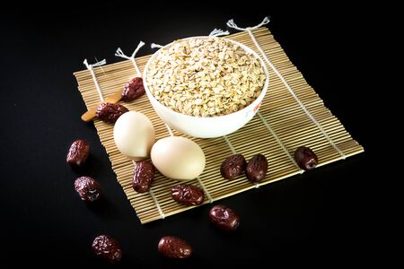 Close up to chinese herbs on a bamboo matの写真素材
