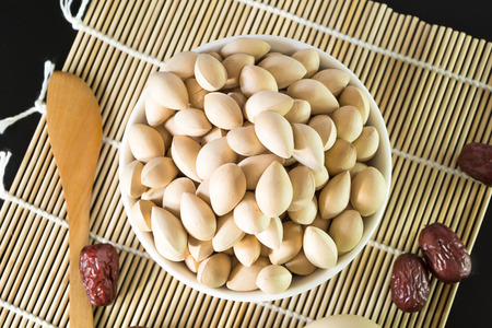 Close up to chinese herbs on a bamboo matの写真素材