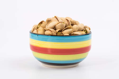 Pistachio nuts. Isolated on a white background.の写真素材