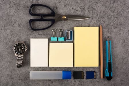 Colorful stationery on wooden background