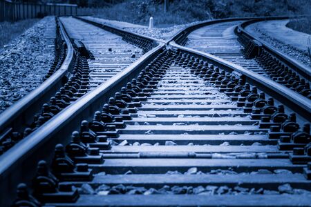Railway in fog on station, outdoor landscape
