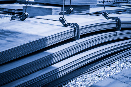 Stainless steel sheets deposited in stacksのeditorial素材