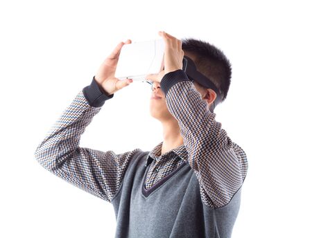 middle aged man wearing virtual reality headset is stunned by VR experience