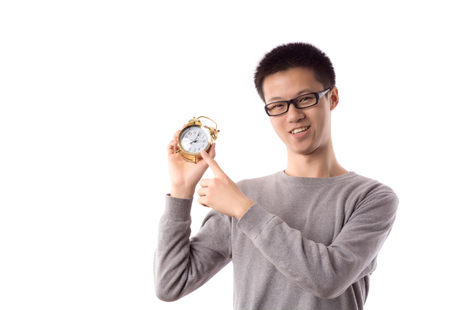 young guy with an alarm clock