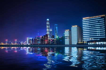 Shanghai, China city skyline on the Huangpu River.